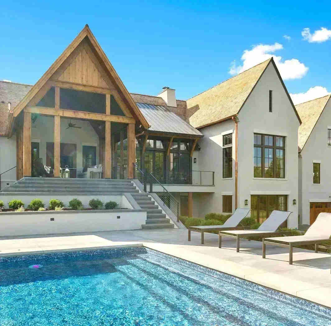 Modern luxury home with swimming pool representing homeowners insurance